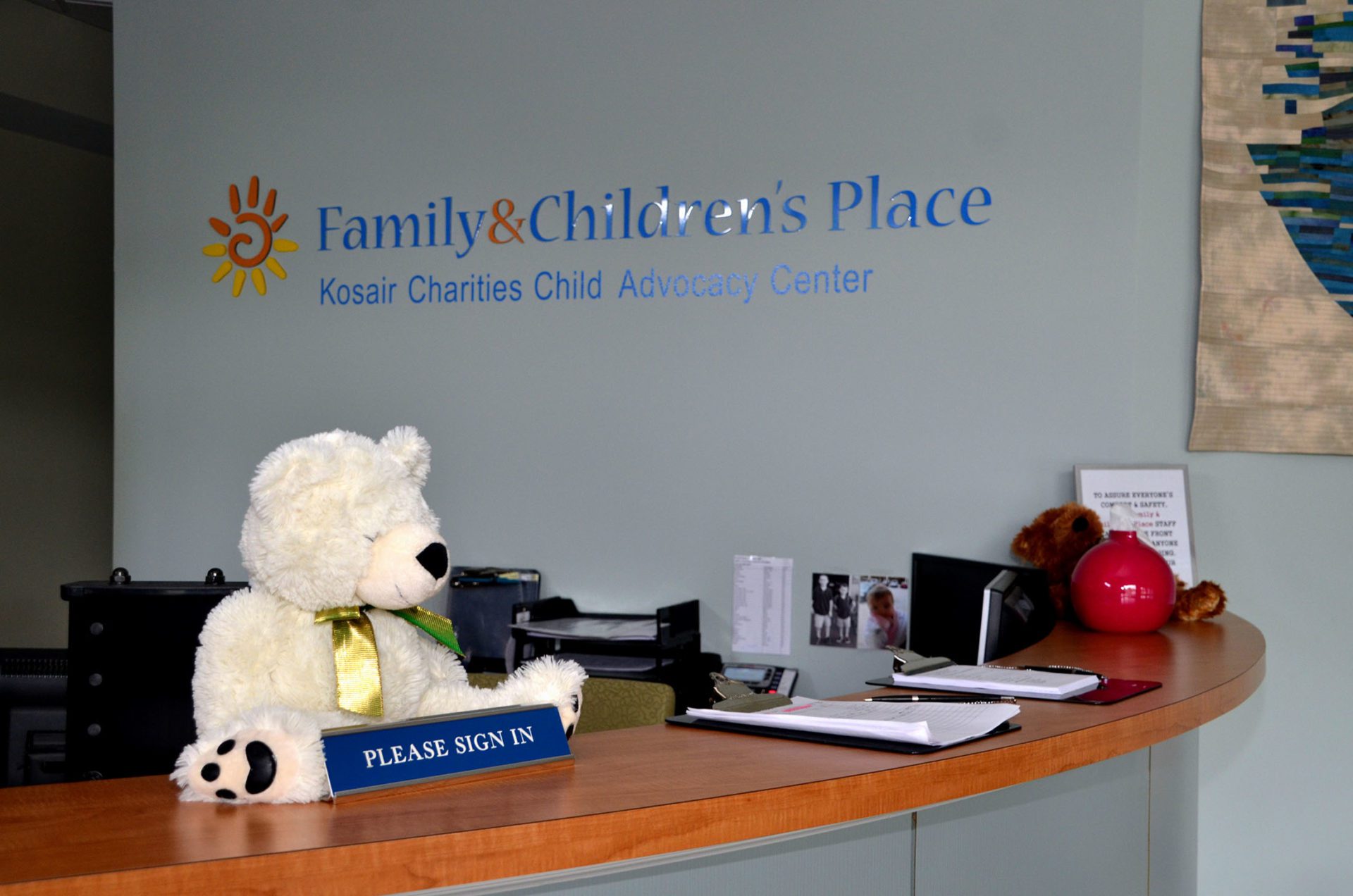 Family & Childrens Place front desk with bear